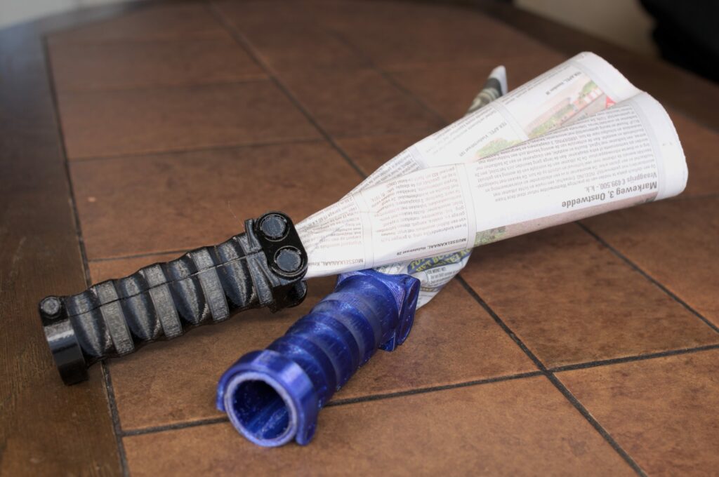 Fly swatter newspaper handle (print-in-place)